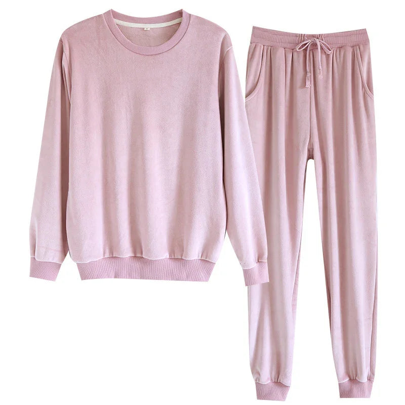Soft pink long sleeve sweatshirt and matching drawstring jogger pants loungewear set