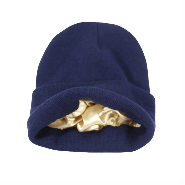 navy blue knit beanie hat with beige satin lining inside