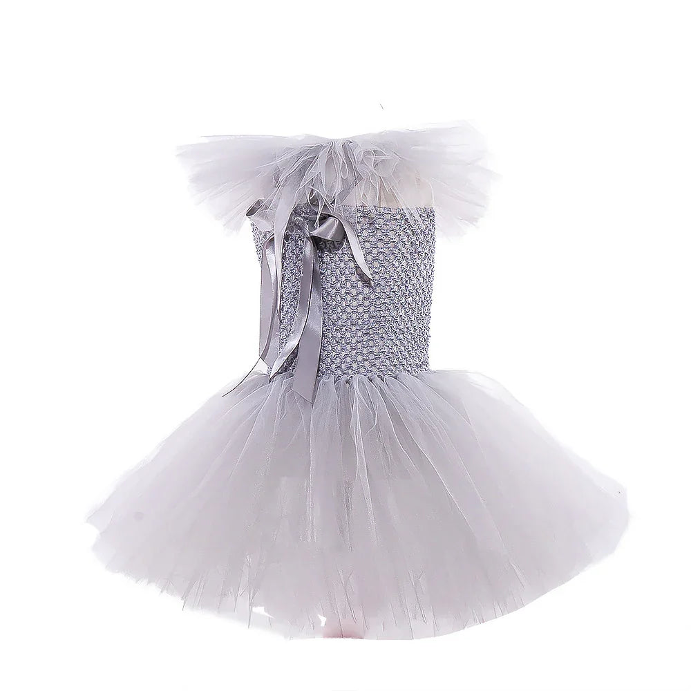 Silver-grey tutu dress with smocked bodice, tulle skirt, and ribbon bow on shoulder