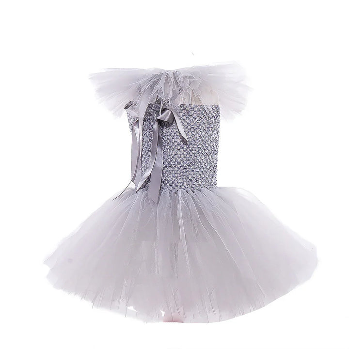 Silver-grey tutu dress with smocked bodice, tulle skirt, and ribbon bow on shoulder