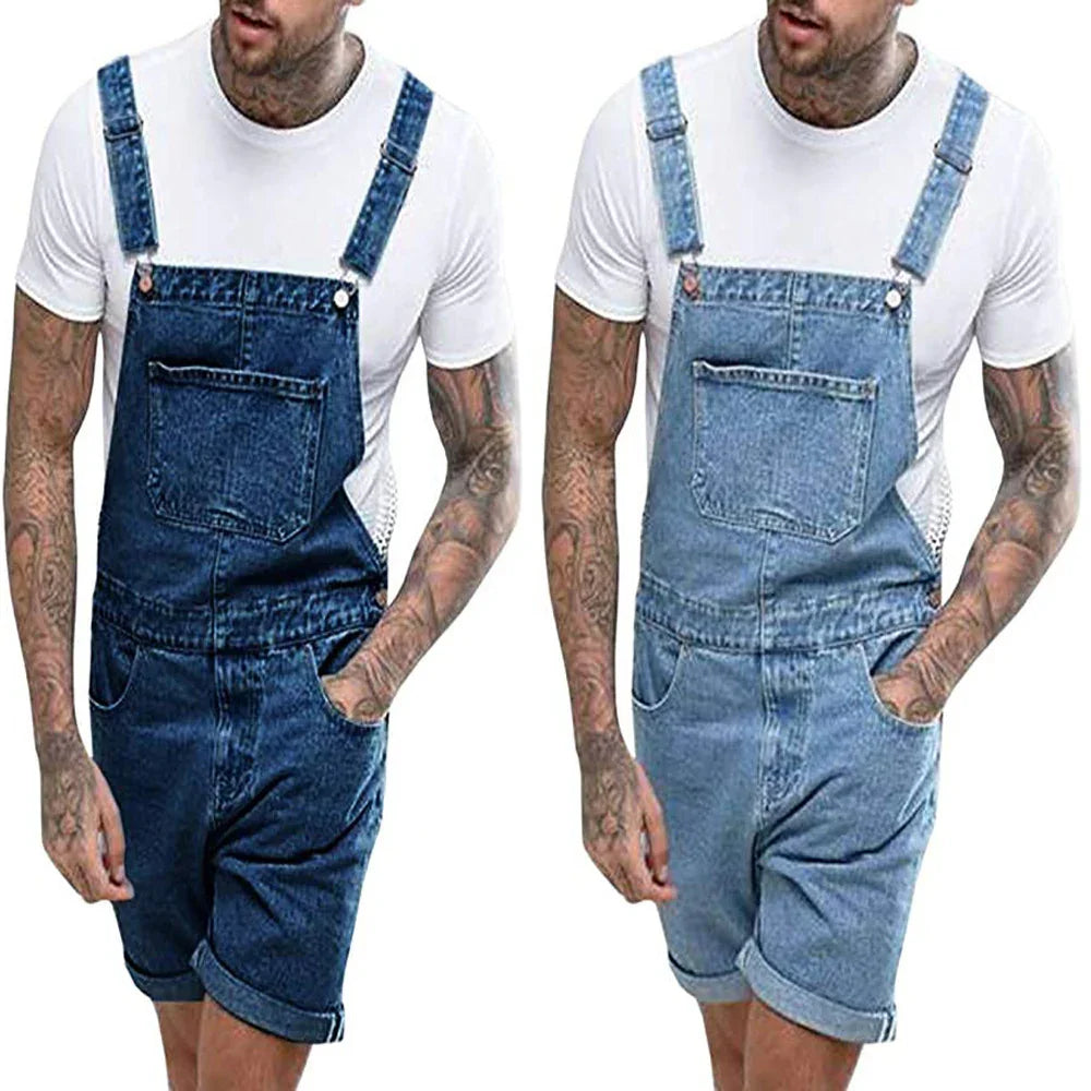 Male model wearing white t-shirt with dark blue and light blue denim short overalls, tattooed arms