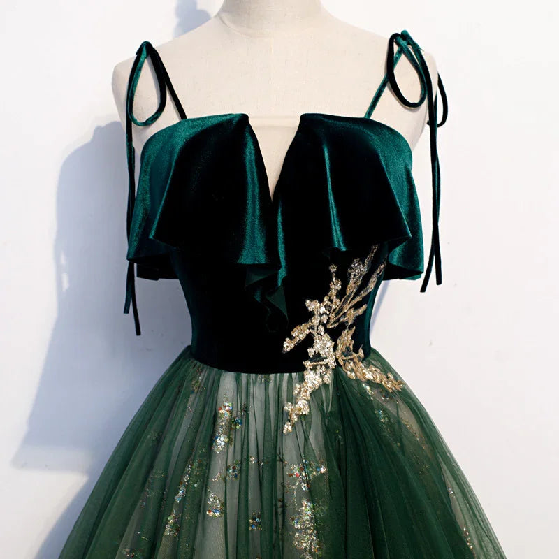 Elegant dark green velvet evening dress with gold floral embroidery and tulle skirt