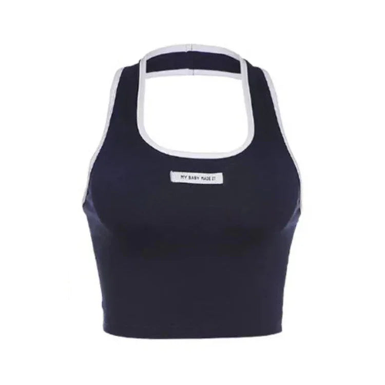 Navy blue sports bra with white trim and a label reading 'MY BABY MADE IT' on front