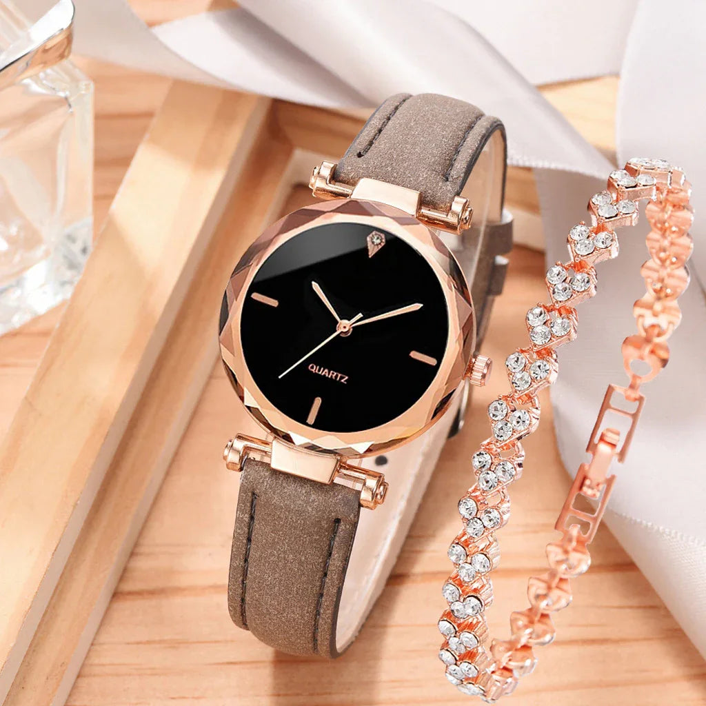 Elegant women's quartz watch with black dial, rose gold case, and brown leather strap alongside crystal bracelet