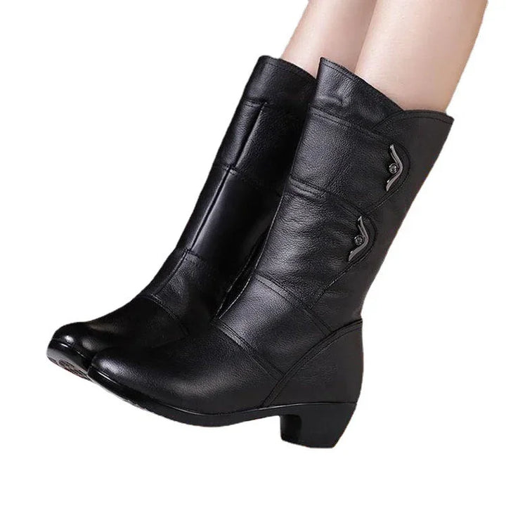 Black mid-calf women's leather boots with low heels and decorative side buttons