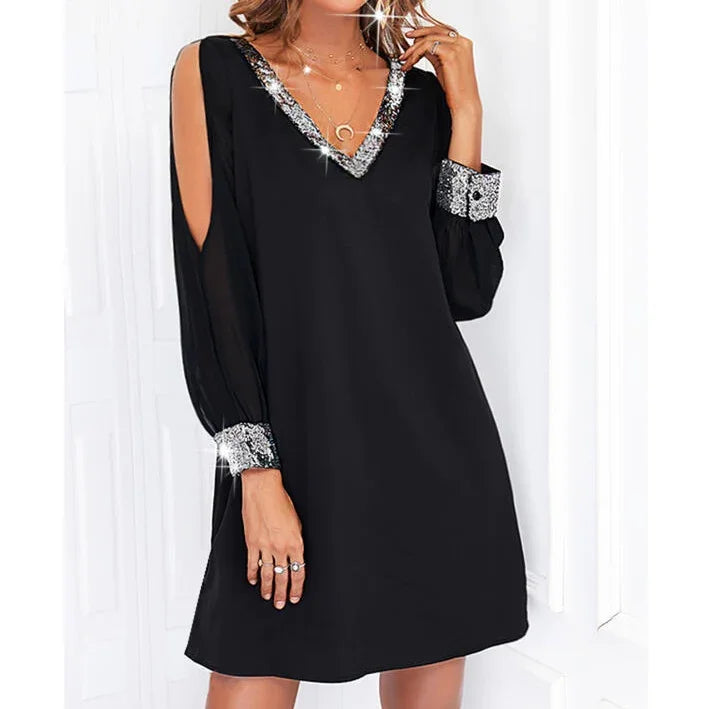 Black long sleeve mini dress with sequin V-neckline and cuffs, featuring shoulder cut-outs