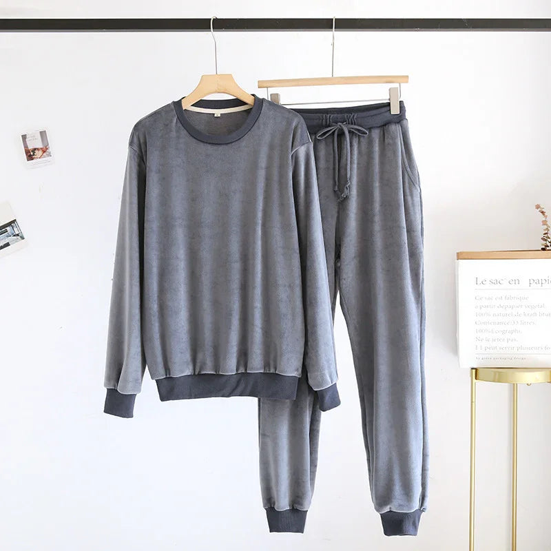 Gray soft fleece long-sleeve sweatshirt and jogger pants loungewear set on wooden hangers
