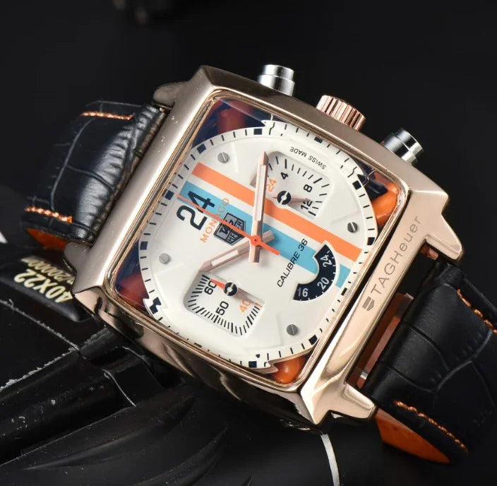 Luxury TAG Heuer Monaco wristwatch with square rose gold case, white dial, black leather strap