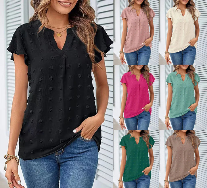 Women wearing textured short sleeve V-neck blouses in black, pink, cream, magenta, teal, green, and brown jeans casual outfits