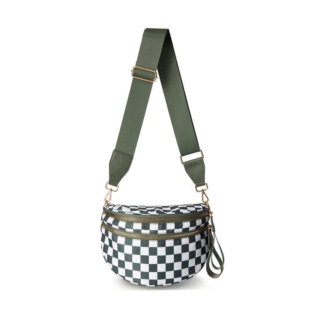 Checkered black and white waist bag with adjustable green shoulder strap and gold zippers