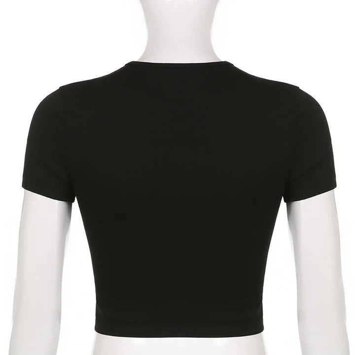 Back view of black short sleeve cropped t-shirt on mannequin with white background