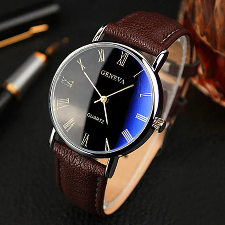 Geneva quartz wristwatch with black dial, gold Roman numerals, silver case, brown leather strap