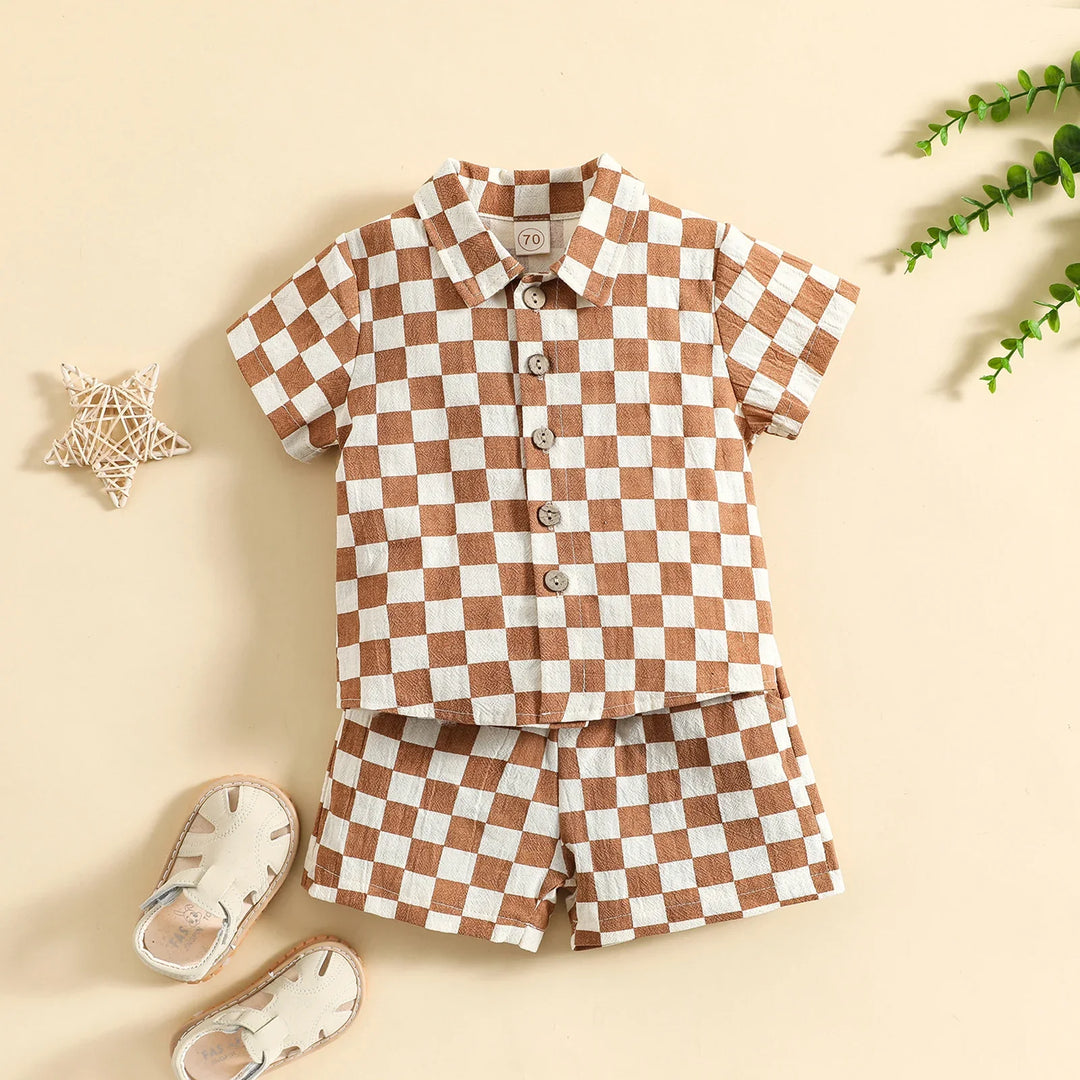 Brown and white checkered toddler shirt and shorts set with beige sandals and decorative star