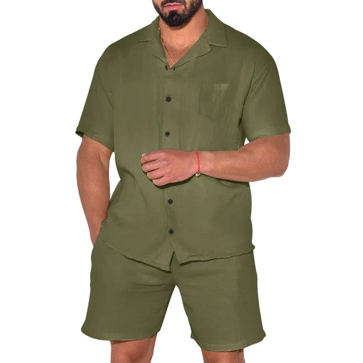 man wearing olive green short sleeve button-up shirt and matching shorts set