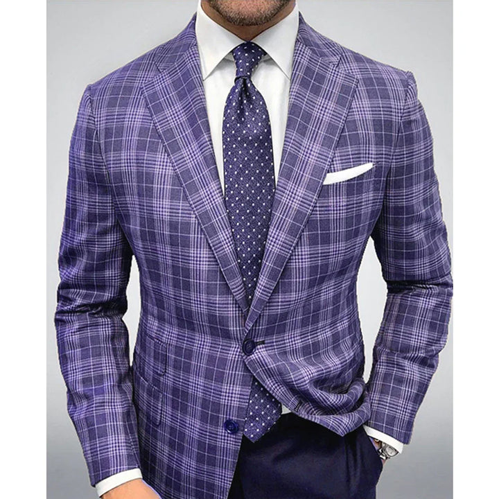 Man wearing a purple plaid suit jacket with white dress shirt and navy blue polka dot tie