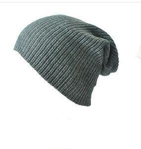 Gray ribbed knit slouchy beanie hat isolated on white background