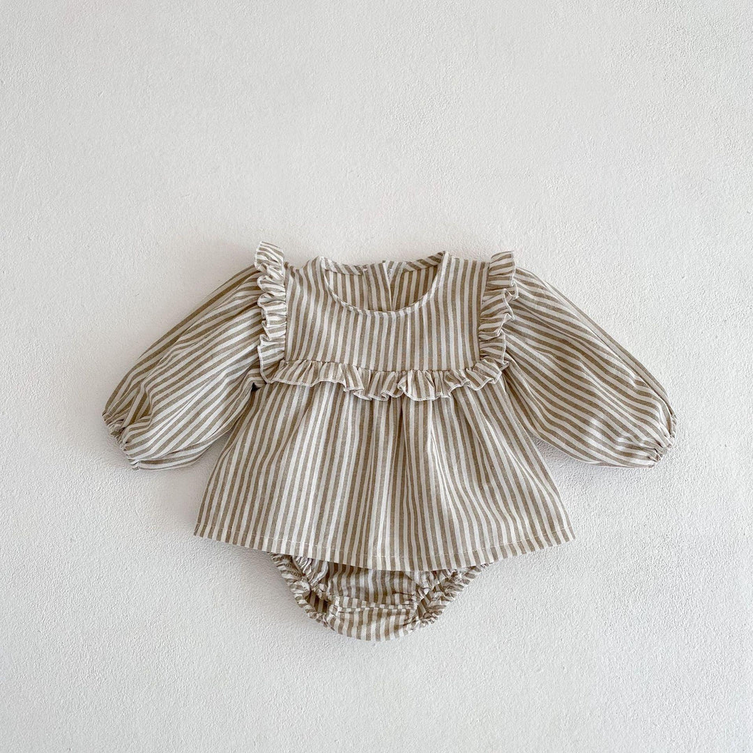 Beige and white striped baby romper with long puff sleeves and ruffle details on chest