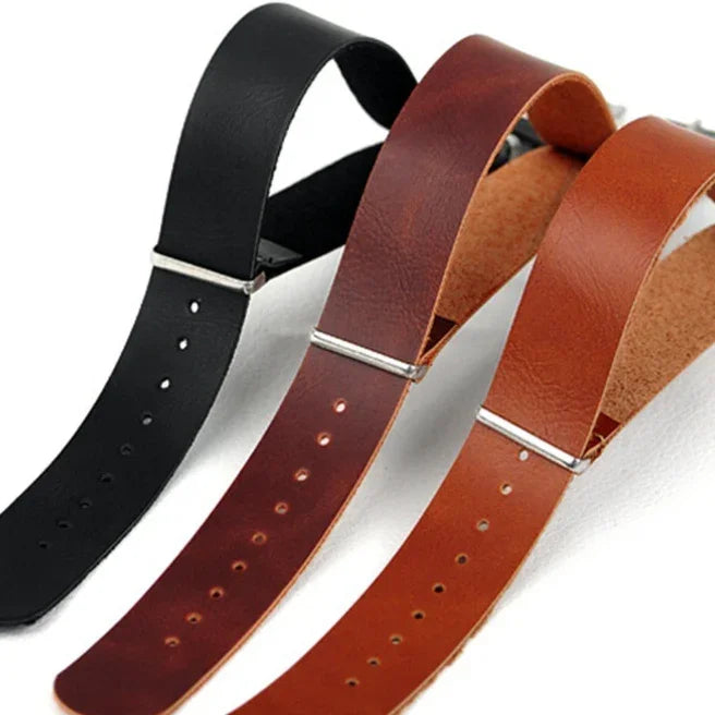 Three leather belt straps in black, dark brown, and light brown with silver buckles on white background
