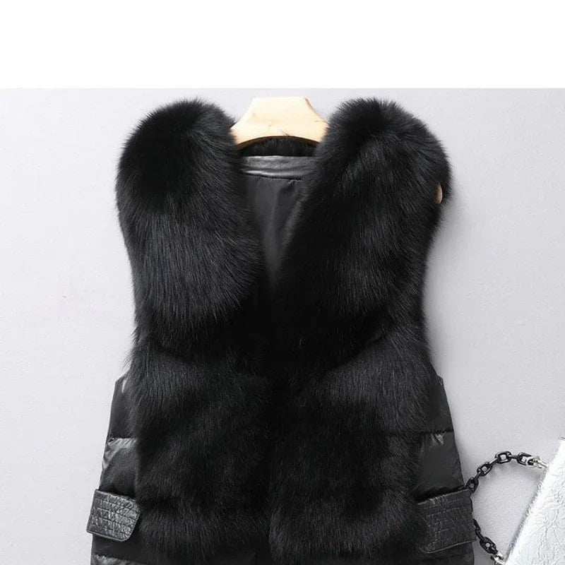 luxurious black fur vest with thick plush collar on wooden hanger against gray wall