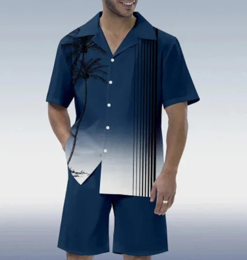Man wearing navy blue short-sleeve button-up shirt and matching shorts with palm tree and stripe design