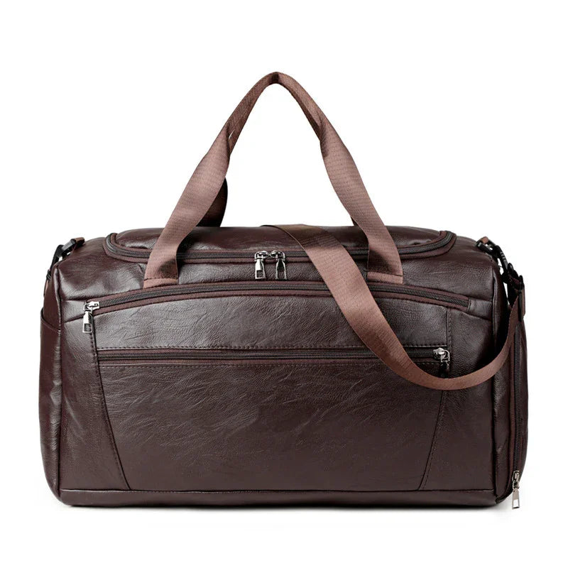 Brown leather duffel bag with multiple zippered compartments and matching brown straps