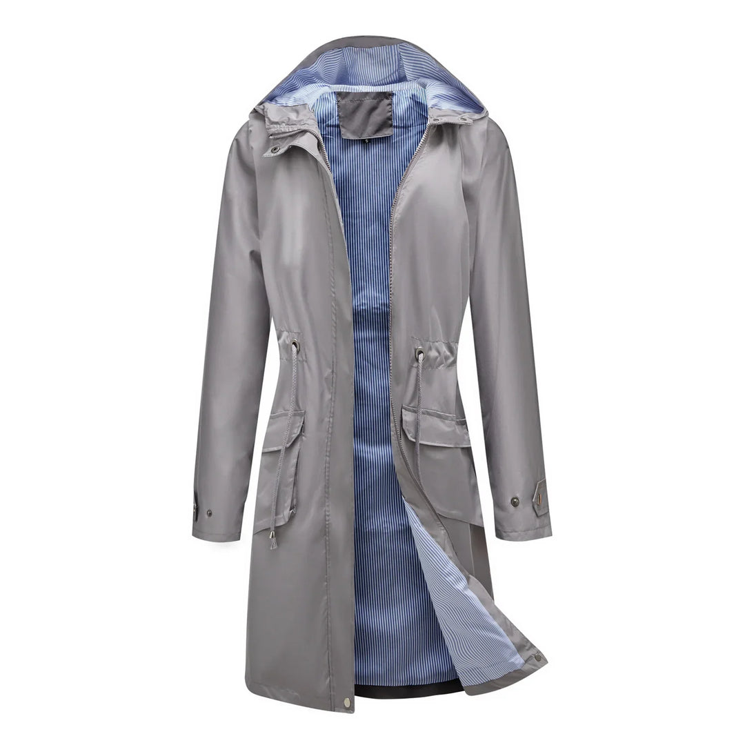 Light gray women's raincoat with blue striped inner lining, hood, drawstring waist, and front pockets