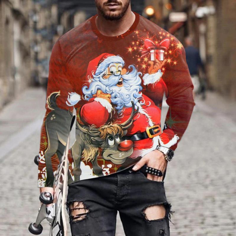 Man wearing festive Christmas sweater with cartoon Santa and reindeer holding a gift box