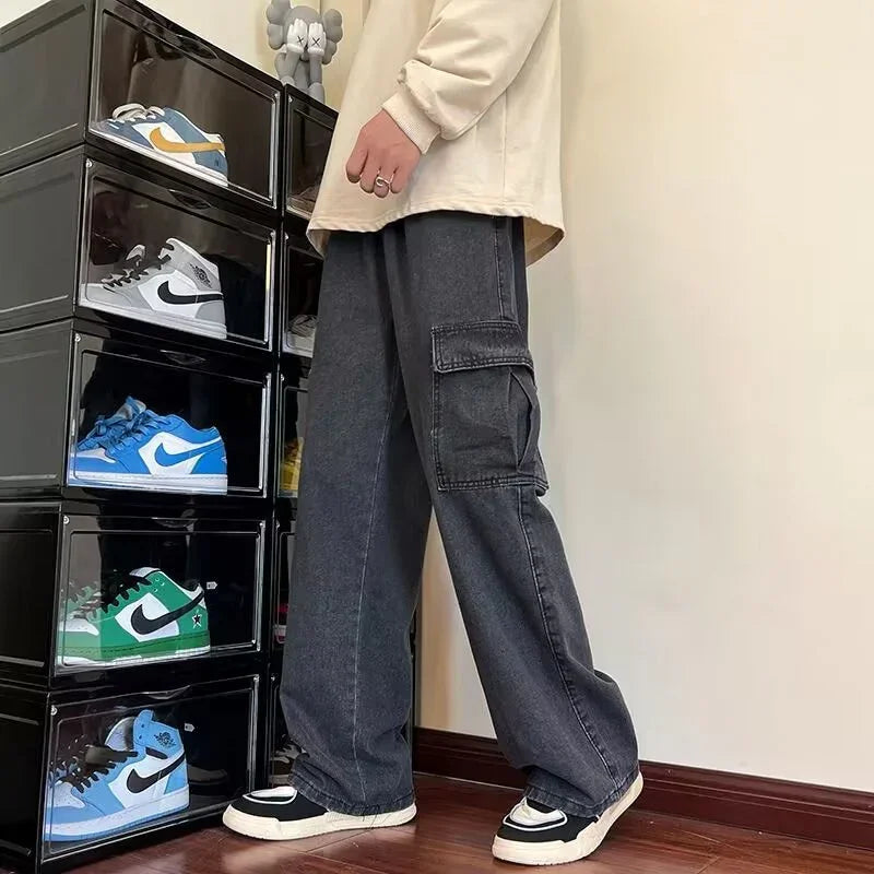 Casual style with black cargo pants and black white sneakers beside transparent shoe storage cabinet