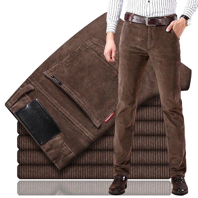 Men's brown corduroy pants styled with a striped shirt and leather belt, folded fabric background