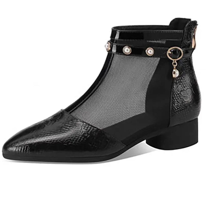 Black mesh ankle boot with faux leather toe and heel, pearl-studded strap, and low block heel