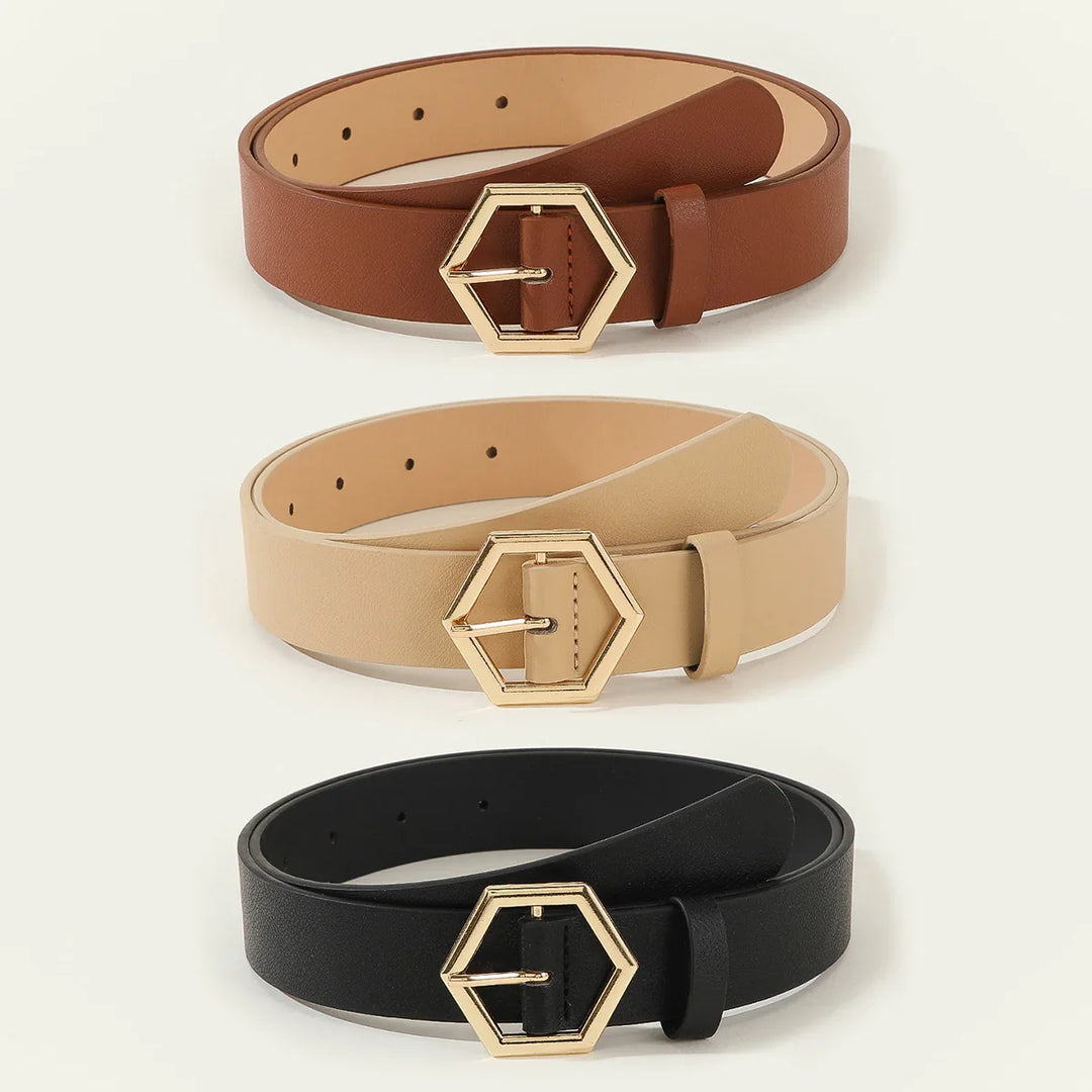 Set of three stylish leather belts in brown, beige, and black with gold hexagon buckles