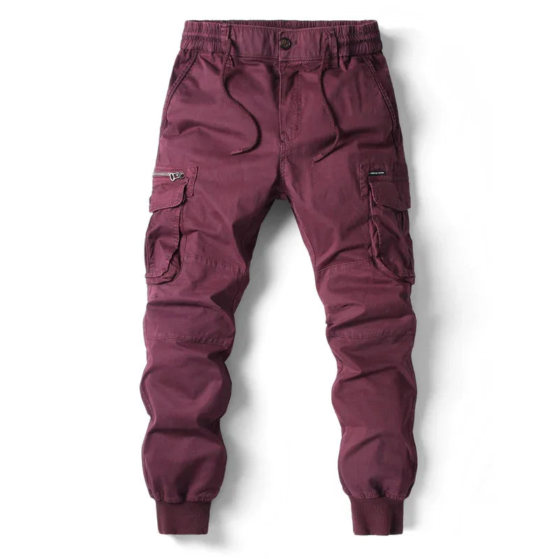 Men's maroon cargo jogger pants with elastic waistband and multiple side pockets