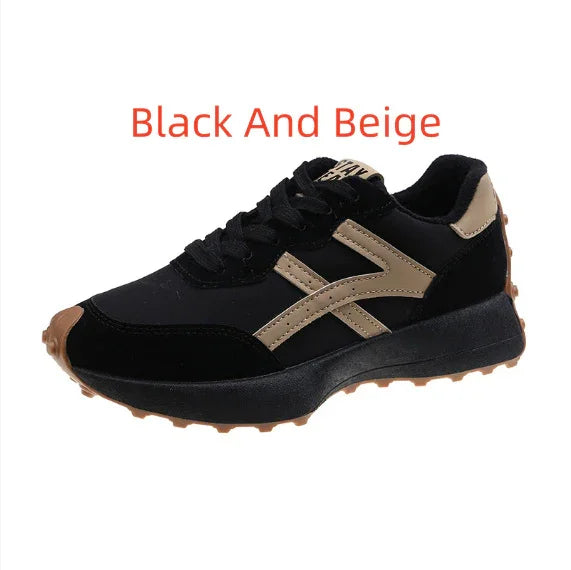 Black and beige casual sneaker with textured sole and lace-up design