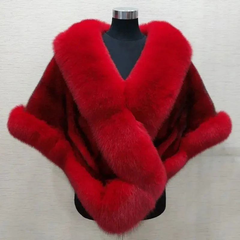 luxurious red fur shawl with plush collar and cuffs displayed on black mannequin