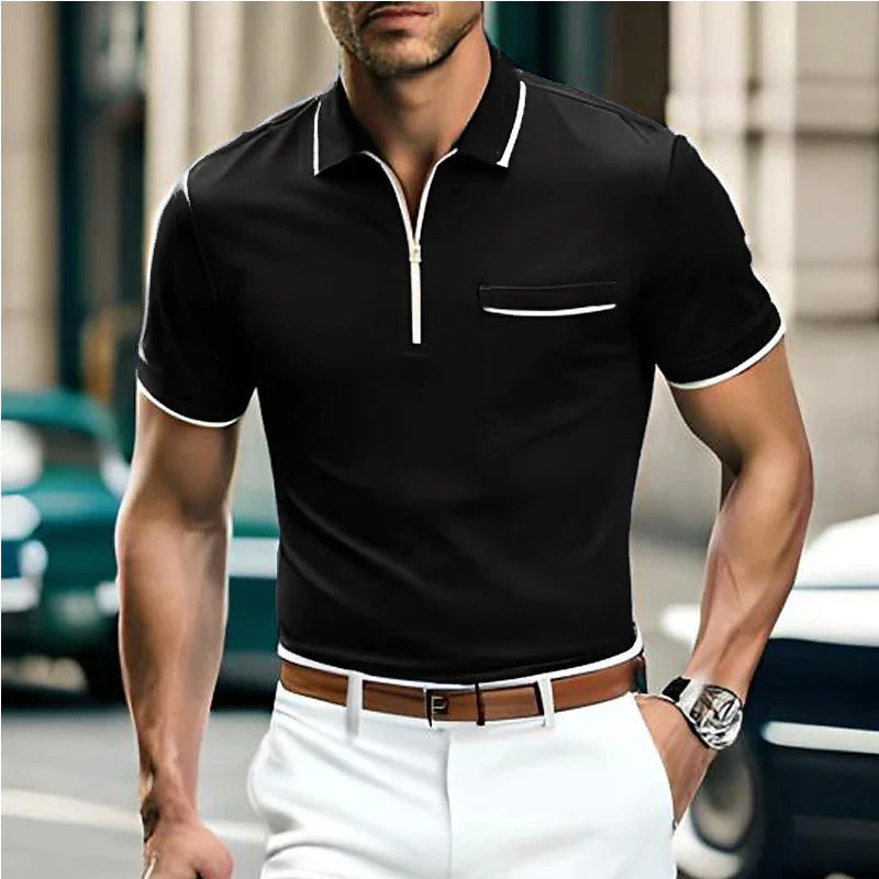 Man wearing black short-sleeve polo shirt with white trim and white pants, brown belt, wristwatch