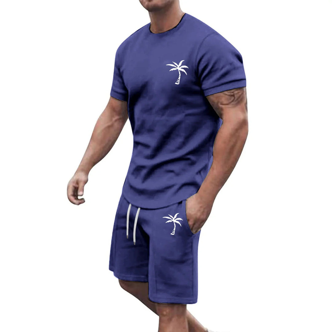 Muscular man wearing navy blue casual matching t-shirt and shorts with white palm tree logo