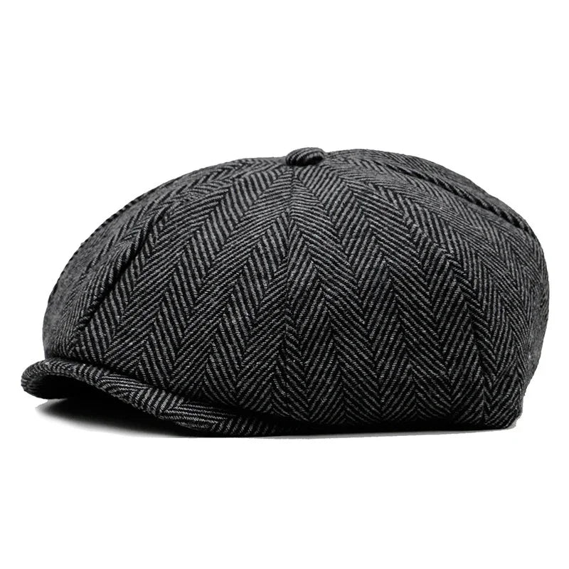 Black and gray herringbone pattern newsboy cap with button on top and small brim