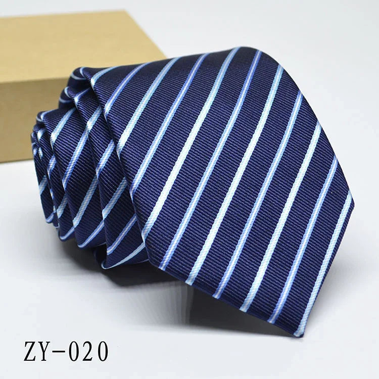Classic navy blue men's tie with light blue diagonal stripes, elegant formal accessory