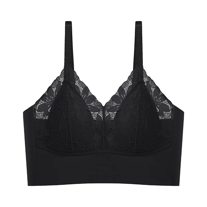 Black lace bralette with floral mesh design and adjustable straps on white background