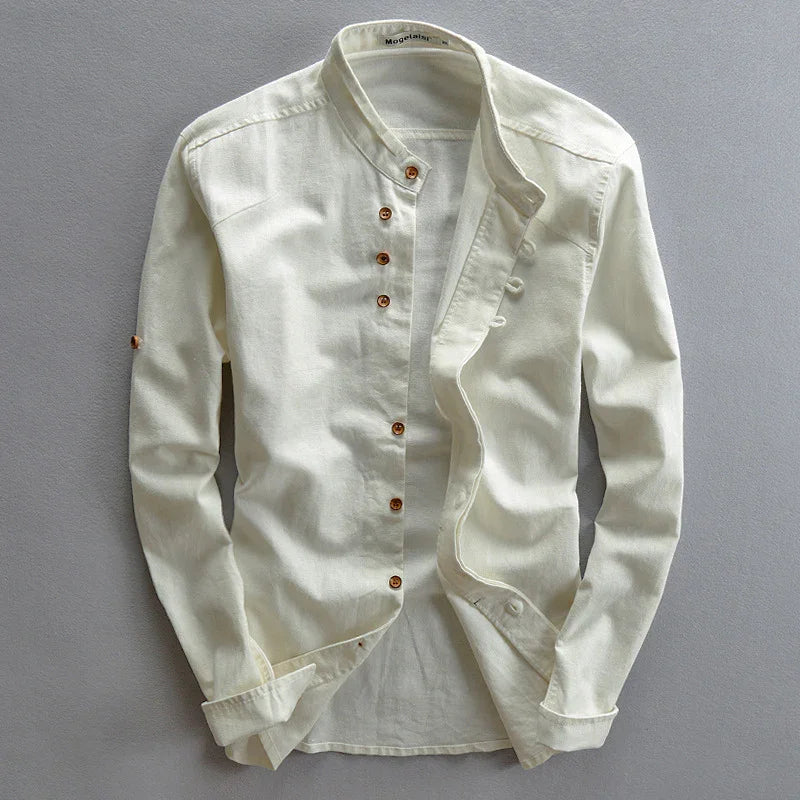 Men's casual cream white cotton shirt with brown buttons and mandarin collar, laid flat