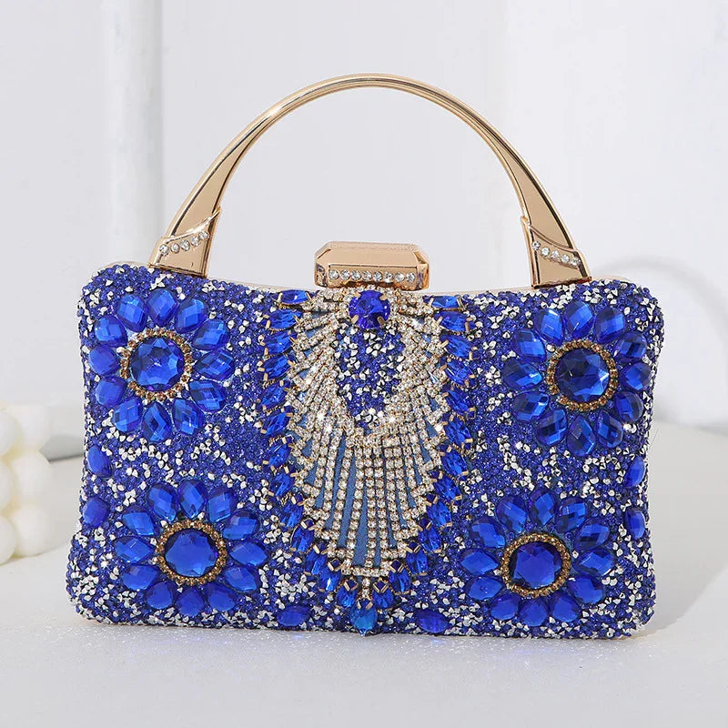 luxury blue crystal embellished evening clutch bag with gold handle and floral design