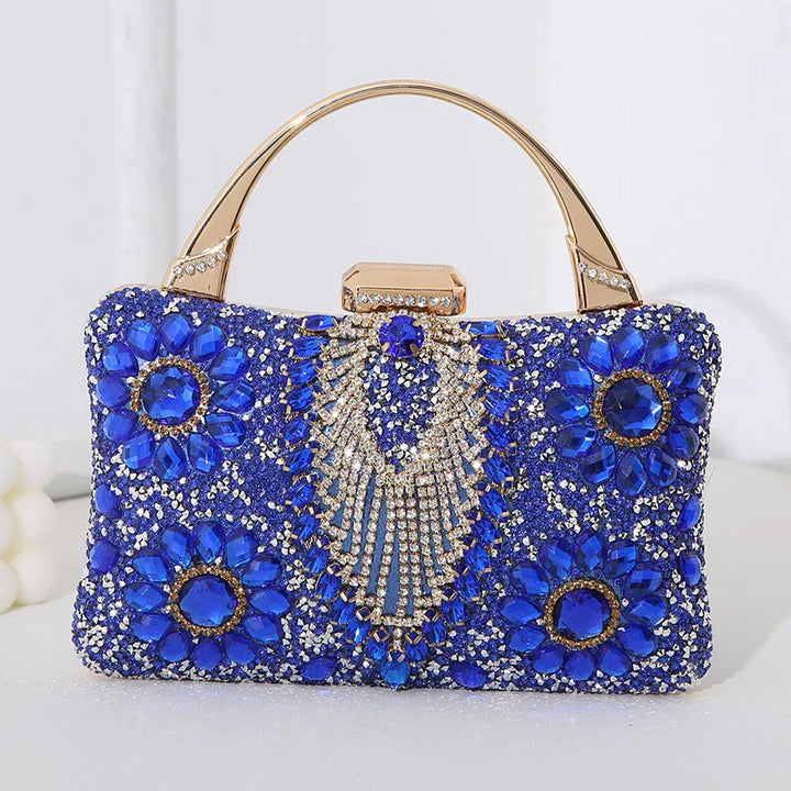 luxury blue crystal embellished evening clutch bag with gold handle and floral design