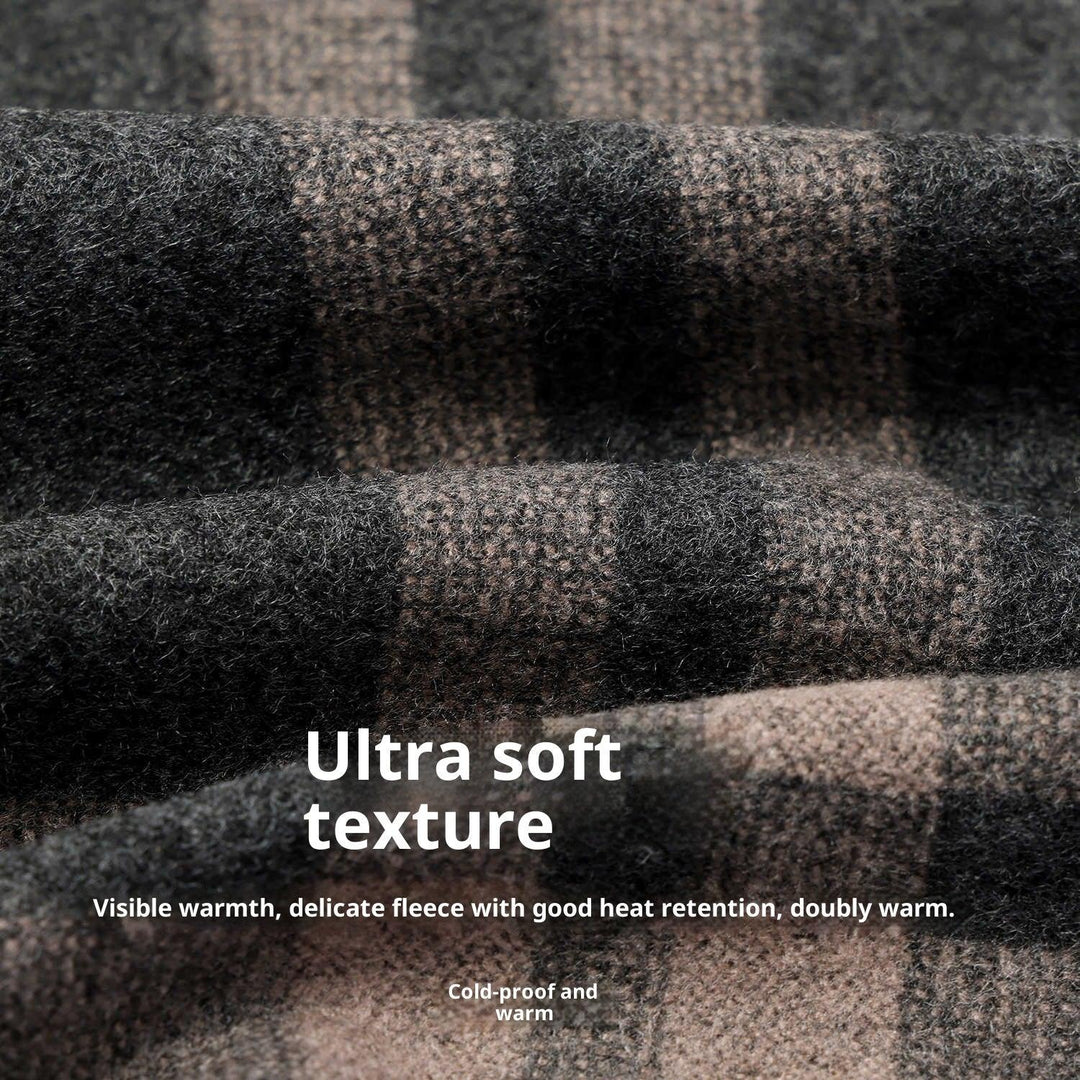 Close-up of ultra soft brown and black plaid fleece fabric with warm texture