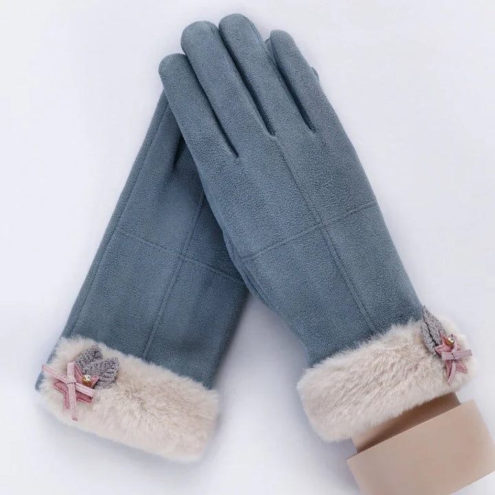 Elegant blue winter gloves with soft beige fur cuffs and decorative pink bows