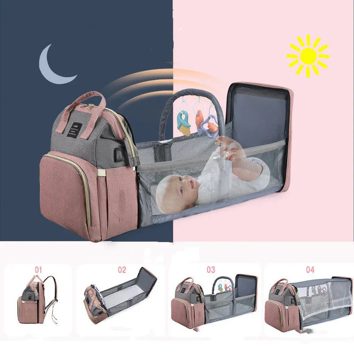 Multifunctional baby diaper bag with foldable mesh crib and hanging toys, day and night use