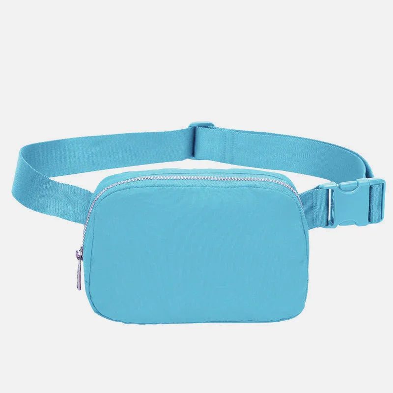 Light blue adjustable waist bag with zipper and buckle, unisex travel pouch