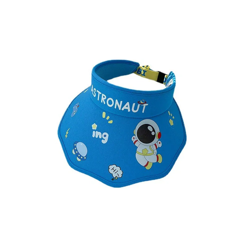 Blue astronaut-themed sun visor with cartoon astronaut, UFO, and space graphics