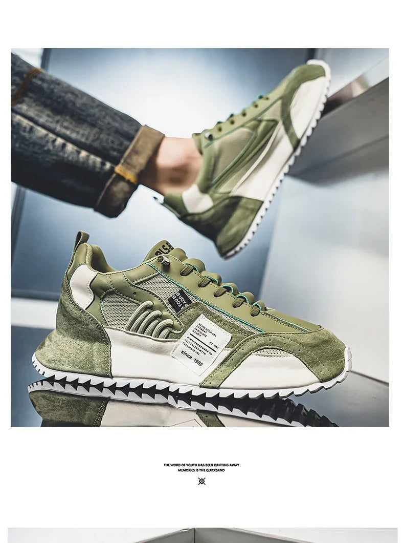 Green and white casual sneakers with textured sole and detailed stitching on reflective surface