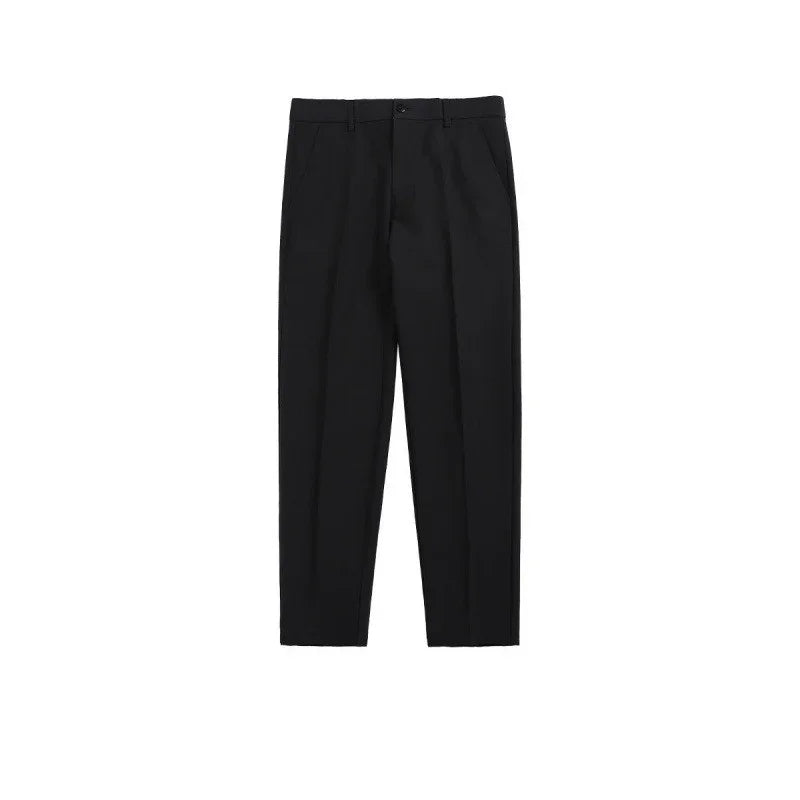 Black formal trousers with front pleats and side pockets on white background