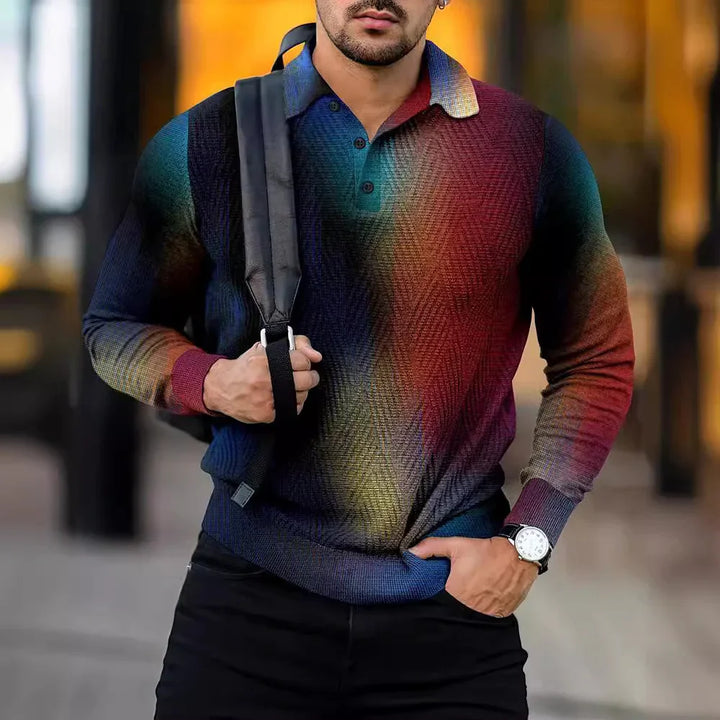 Man wearing multicolor gradient knit long sleeve polo shirt with black pants and watch, carrying backpack